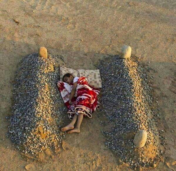 Viral photo of boy sleeping between stone markers